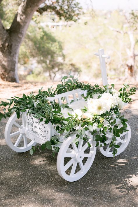 White Wagon For Wedding, Flower Girl Wagon Ideas Wedding, Baby Flower Girl Wagon, Flower Girl Wagon Ideas, Wedding Wagons For Flower Girl, Diy Wedding Wagon, Ring Bearer Wagon, Wagon Wedding, Flower Girl Wagon