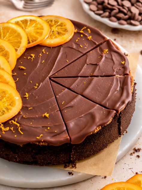 Chocolate Orange Cheesecake Orange Chocolate Cheesecake, Chocolate Orange Cake, Popular Cheesecake Recipes, Raspberry Cream Puff, Chocolate Orange Ganache, Orange Cheesecake Recipes, Digestive Cookies, Chocolate Orange Cheesecake, Graham Cookies