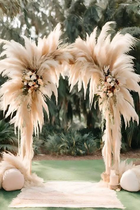 20 Stunning Wedding Arch Ideas to Add Romance to your Big Day - Prairie Hive Wedding Arch Beach Ideas, Boho Chic Party Decorations, Gatsby Wedding Arch, Boohoo Wedding Decoration, Mountain Wedding Arch, Feather Arch, Diy Wedding Arches, Boho Rustic Wedding Decor, Pampas Wedding Decor