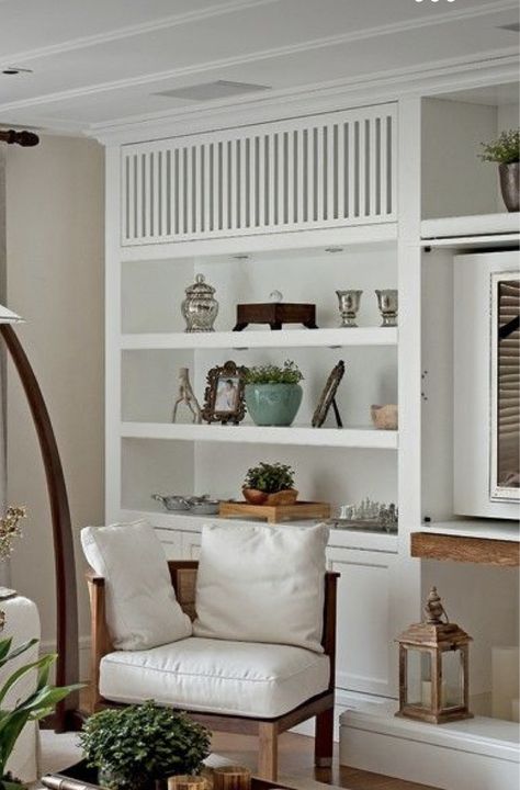 Mini Split Bookcase, Concealing Mini Split, Mini Split In Living Room, Built In Around Mini Split, Decorating Around A Wall Ac Unit, Ac Split Unit Cover, How To Cover A Mini Split, Covering Mini Split, Built In Air Conditioner