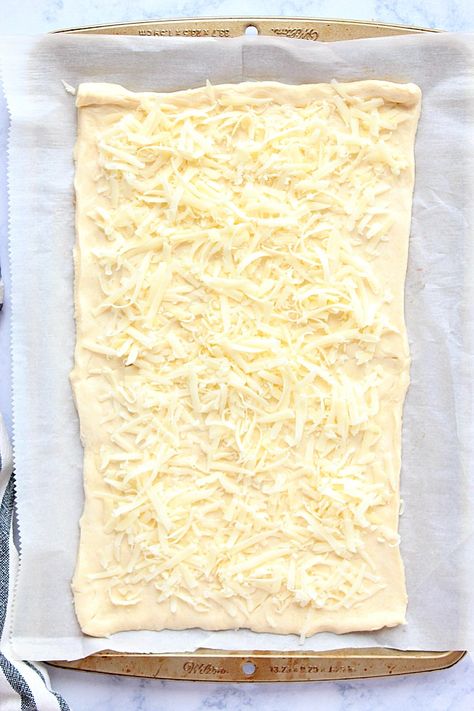 How to make breadsticks with crescent roll dough. Crescent Roll Flatbread, Cheese Bread With Crescent Rolls, Cheesy Bread With Crescent Rolls, Cresent Roll Dough Sheet Recipes, Crescent Roll Bread Recipes, Pilsbury Crescent Sheets Recipes, Garlic Crescent Roll Recipes, Crescent Garlic Rolls, Crescent Roll Garlic Cheese Bread