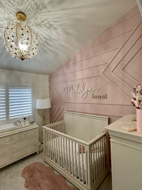 Wall Design Nursery, Blush Accent Wall Nursery, Wood Trim Accent Wall Nursery, Valspar Lovebug, Nursery With Pink Accent Wall, Hobby Lobby Baby Girl Nursery, Baby Girl Accent Wall Nursery, Mauve Accent Wall Nursery, Girl Nursery Accent Wall Ideas