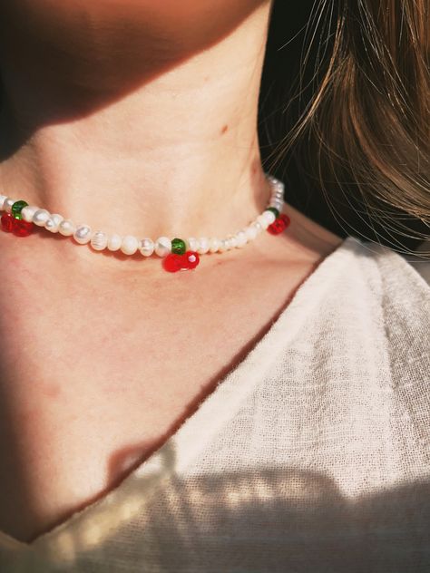 Girl is wearing a pearl Chocker with cherries Pearl Cherry Necklace, Cherry Pearl, Trendy Chokers, Cherry Necklace, Pearls Diy, Red Cherry, Pearl Choker Necklace, White Freshwater Pearl, Pearl Choker