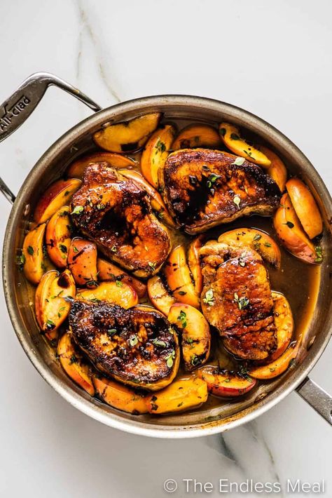 These summer pork chops with peaches are sweet, juicy, and so delicious. With fresh peaches, brown sugar, thyme, and balsamic glaze, it's a flavorful way of preparing pork chops that celebrates the season. Peach pork chops are also easy to make with less than 10 ingredients, and they're ready in under 30 minutes! #theendlessmeal #peachporkchops #peaches #peach #pork #porkchops #summer #summerporkchops Pork Chops With Peaches, Peach Pork Chops, Brown Sugar Peaches, Fresh Peach Recipes, Grilled Corn Salad, Glazed Pork Chops, Juicy Pork Chops, Pork Glaze, Grilled Pork Chops