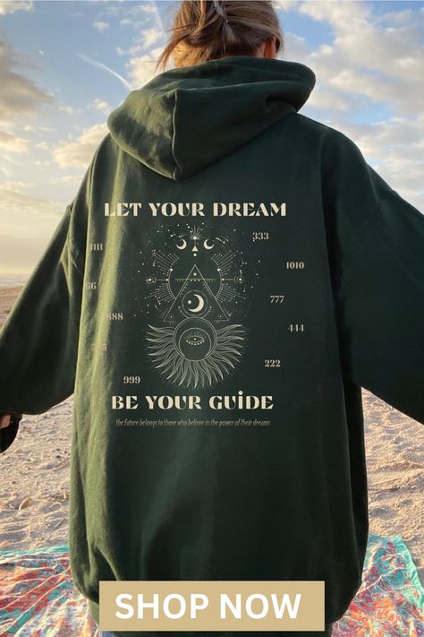 angel numbers hoodie with angel numbers surrounding a celestial image of constellations, multiple moons, and an evil eye. the words on the hoodie and around the celestial drawing are "let your dream be your guide. - the future belongs to those who believe in the power of their dreams" Hoodie And Shorts Outfit, Witchy Gift Ideas, Hoodie Inspiration, Angel Number Hoodie, Spreading Positivity, 1 Year Anniversary Gifts, Personalised Gifts For Friends, Presents For Best Friends, Manifest Abundance