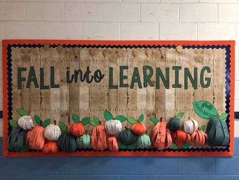 Fall into Learning October bulletin board! Students used nouns and adjectives to describe all things fall on strips of paper before they were assembled to create 3D pumpkins! How To Make 3d Pumpkin Bulletin Board, 3d Pumpkins For Bulletin Boards, 3d Fall Bulletin Boards, 3d Pumpkin Bulletin Board, Fall Pta Bulletin Board Ideas, Fall Bulletin Board Ideas Elementary, Fall Decor For Classroom Bulletin Boards, Fall Pto Bulletin Board Ideas, Fall Into Learning Bulletin Board