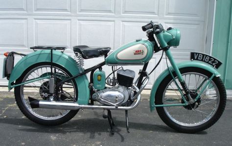 After World War II, Germany was scheduled to pay the Allies $23 billion as part of reparations. A very small part of this compensation was DKW’s design for the RT125, which ended up becoming one of the most copied motorcycles in history. American riders may have seen the design evolve into the Harley Davidson Hummers, while British riders got the Bantam from BSA. This bike has been restored and it looks to be a fine example of a later D3 model. Bsa Bantam, Ducati Monster Custom, Womens Motorcycle Helmets, Bsa Motorcycle, Triumph Bikes, Custom Motorcycle Helmets, Vintage Motorcycle Posters, British Motorcycles, Old Motorcycles