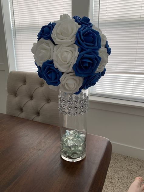 Royal Blue And White Wedding Centerpieces, Royal Blue And Silver Quinceanera Centerpieces, Quince Center Piece Ideas Royal Blue, Royal Blue Centerpieces Quinceanera Diy, Royal Blue And White Centerpieces, Royal Blue Quinceanera Centerpieces, Blue And White Centerpieces For Party, Royal Blue Quince Centerpieces, Blue Centerpieces Quinceanera