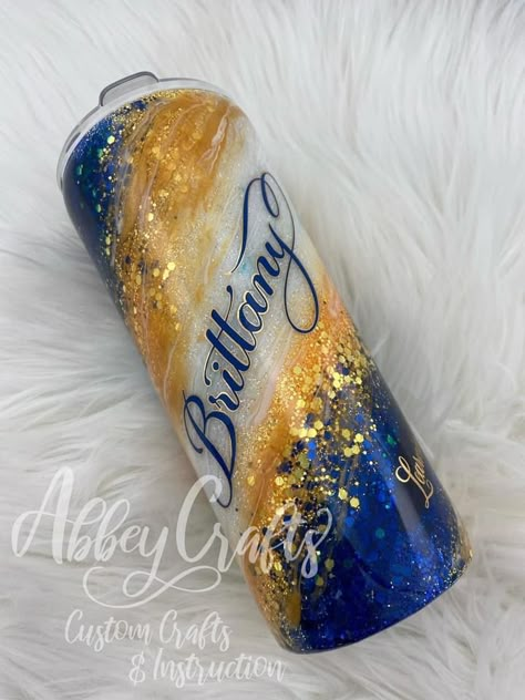 Penn State Tumbler Ideas, Ffa Tumbler Cups, Blue And Yellow Glitter Tumbler, Ffa Tumbler, Cheer Cups, Milkyway Tumbler, Resin Tumbler Ideas, Custom Tumbler Ideas, Tumbler Design Ideas