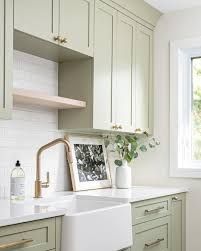 Colors For Laundry Room Cabinets, Laundry Room With Sage Green Cabinets, Laundry Cabinet Paint Colors, Pale Green Laundry Room, Light Green Cabinets Laundry Room, Painted Cabinets In Laundry Room, Light Green Laundry Room Cabinets, Laundry Room Ideas Painting, 2 Tone Laundry Cabinets