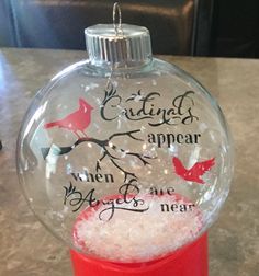 Floating ornament: I cut out the design on vinyl using my Cricut and  attached it to an acetate ornament I cut out, then inserted it into the  round glass ... Cricut Ornaments, Floating Ornaments, Fake Snow, Christmas Vinyl, 12 December, Memorial Ornaments, Table Of Contents, First Christmas Ornament, Xmas Ornaments