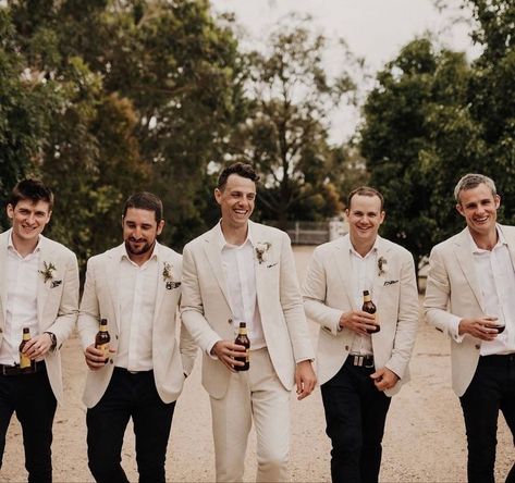 Suit Styles For Men Wedding, Tan Groom Suit With Black Groomsmen, Tan Suit Jacket Black Pants Men, Tan Linen Wedding Suit, Groom With Tan Suit, Beige Groom And Groomsmen, Casual Wedding Groomsmen Attire, Groom Tan Suit Groomsmen Black, Tan And Black Suit Wedding