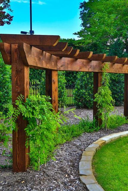 Arbors With Swings, Decorative Pergola Ideas, Rustic Arbors And Pergolas, Planters Around Pergola Posts, Curved Arbor Trellis, Single Post Pergola Ideas, Arbour Patio Ideas, Shade Arbor Ideas, Backyard Arbor Ideas Landscaping