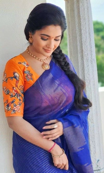 Blue saree with orange blouse Blue Saree With Orange Blouse, Blue Saree Contrast Blouse, Contrast Saree, Best Blouse Designs, Orange Saree, Saree Blouse Patterns, Awesome Blouse, Hacks Clothes, Designer Saree Blouse Patterns