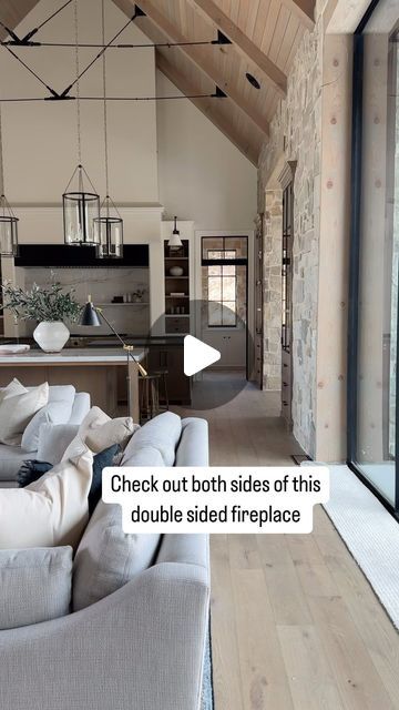 Check out this open double sided fireplace in the great room and library of our #threefallsproject! 🤍🤍🤍  Build @splitrockcustomhomes and @grovehomesutah Arch @stevetiek Two Sided Stone Fireplace, Two Sided Fireplace Living Room, Becki Owens Living Rooms, Entryway With Fireplace, Fireplace Next To Front Door, 4 Sided Fireplace, Double Fireplace Living Room, Fireplace In The Middle Of The Room, Fireplace Middle Of Room