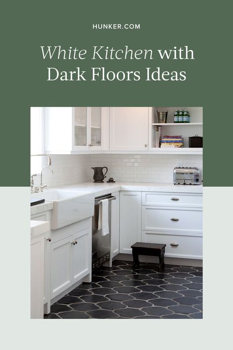 A white kitchen with dark floors is a timeless design choice, and will be sure to age well with your home. Ahead, we've rounded up eight jaw-dropping examples that will make you cross over to the dark side. #hunkerhome #whitekitchen #darkfloor #whitekitchenideas #kitchen Black And White Floors Kitchen, Kitchen With Black Floor, Kitchens With Dark Floors, White Kitchen With Dark Floors, Black Floor Kitchen, Kitchen With Dark Floors, Dark Tile Floors, White Kitchen Counters, Dark Kitchen Floors