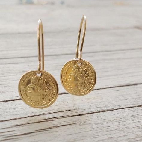 Buy an original Greek earring Gold Plated Phaistos three Disc | Discover Greek Jewelry within a huge collection of Ancient Greek Jewelry | shipping worldwide This amazing piece of jewelry is representing the Ancient Greek Symbol so called Phaistos disc from the Minoan Palace on the Greek islanf of Crete. To this day it is one of archeology's most famous mysteries. Made of a mixing of sterling silver 925 and 18k gold full filled plated.An excellent gift for women and also for men that want to mak Chain Types, Rough Gemstone Jewelry, Coin Jewellery, African Paintings, Gold Bar Earrings, Hammered Hoop Earrings, Bar Stud Earrings, Collar Pins, Coin Earrings