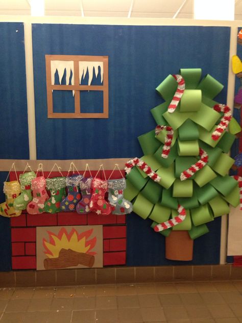 Reindeer Bulletin Boards For Preschool, Bulletin Board Fireplace, 3d Christmas Bulletin Boards, Wrapping Paper Bulletin Board, Fireplace Bulletin Board Ideas, Buddy The Elf Bulletin Board, Elf On The Shelf Bulletin Board Ideas, Elf Bulletin Board Ideas, Classroom Christmas Ideas