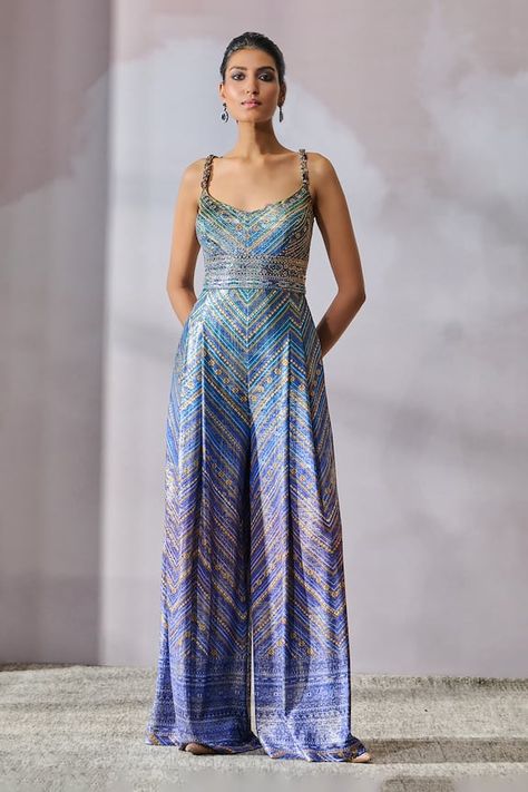 Blue jumpsuit featuring geometric chevron prints, embellished by crystal work and placed jewel detail on straps. - Aza Fashions Banarsi Jumpsuit, Ethnic Jumpsuit Indian, Sari Pants, Ethnic Jumpsuit, Indian Jumpsuit, Indian Palazzo, Palazzo Outfits, Jumpsuit Outfit Wedding, Lehenga Ideas