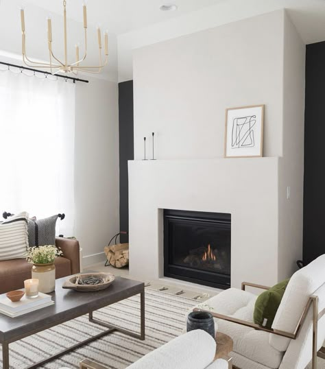 Nordic Minimalism Living Rooms, Joe Lucas Interiors, Modern Neutral Fireplace, 48 Inch Fireplace, Minimal Fireplace Design, Modern Living Room Storage, White Modern Fireplace, Fireplace Minimalist, Minimalist Fireplace Mantle