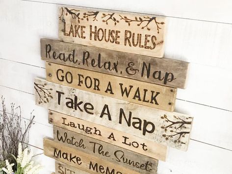 This rustic Lake House Rules sign is completely handmade, using distressed reclaimed wood. I choose boards with different colors and tones to complement each other. I personally wood-burn all the lettering by hand. Each rule fits nicely on its own wood plank. A Lake House Rules Sign makes a wonderful family heirloom! #lakehousewalldecor #houserules Lake House Rules Sign, Wood Lake House, Lake Rules Sign, Lake Rules, House Rules Sign, Reclaimed Wood Decor, Family Rules Sign, Wood Lake, Large Wood Wall Art