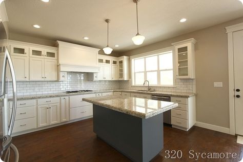 320 Sycamore's kitchen:  White dove cabs, revere pewter walls, giallo ornamental granite. Revere Pewter Walls, Revere Pewter Kitchen, Pewter Kitchen, Giallo Ornamental Granite, Pewter Paint, Glass Cabinets, Shaped Kitchen, Dove White, Wall White