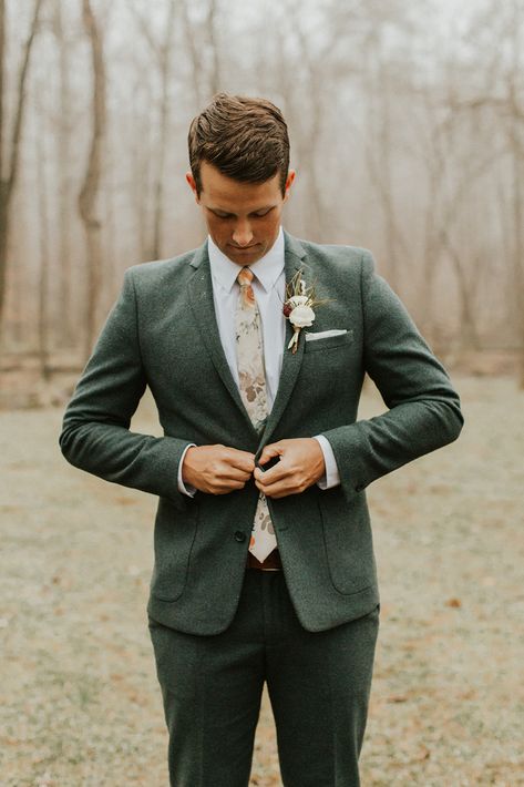 boho woods wedding with floral details and grey grooms suit Trendy Groom Suit, Mens Wedding Suits Green, Boho Suits Men, Green Tweed Suit Wedding, Wedding Suits Groom Green, Green Mens Suit Wedding, Groom Suit Boho, Wedding Suits Green, Grey Green Suit