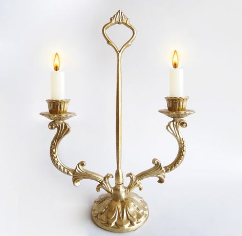 PRICES MAY VARY. Candle holder brass finishing candlestick holders with carrying handle, for weddings fireplace church decoration, Metal candelabra holder. If you're looking for that perfect wedding, anniversary, birthday, housewarming or Mother's Day gift, this stunning candleholder is guaranteed to spark a smile on anyone's face.. Exquisite candlestick holders are perfect for your home decor, living room, bedroom, dinning, garden, restaurant, shop, bar, coffee table, wedding centerpieces and m Vintage Candle Chandelier, Coffee Table Wedding, Victorian Candle Holders, Antique Candle Holders, Candle Holder With Handle, Gold Candlestick Holders, Wedding Fireplace, Wall Mounted Candle Holders, Antiqued Candle Holders