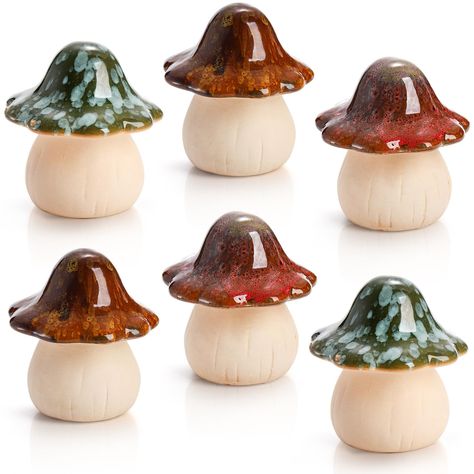 PRICES MAY VARY. Package includes 6 packs of ceramic garden mushrooms in 3 colors, each measures 3.5" D x 4" H. Use it to add a touch of whimsy and vitality to your yard and garden. Peohud garden decor mushrooms are made of quality ceramic material, durable and sturdy. They can withstand rain, sunlight and even freeze, so they can be put it in anywhere, no indoor or outdoor limit. With a beautiful colourful glaze at the top, these ceramic mushroom are unique, cute, and the texture of top is smoo Clay Mushrooms Diy, Pottery Mushrooms, Starter Apartment, Mushroom Statue, Outdoor Pottery, Clay Mushroom, Clay Box, Ceramic Mushroom, Pottery Ornaments