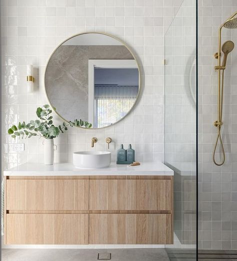 INTERIOR DESIGN | STYLING & DECORATING on Instagram: "✨Introducing the guest en-suite at our Somerton Park Project ✨

We wanted to create a space that was both understated and yet had a subtle wow factor. Our goal was to design a guest bathroom that would feel welcoming and luxurious, but also timeless. I think we nailed it 😉

To achieve this, we focused on selecting classic finishes and fixtures that would stand the test of time. We chose a neutral color palette of warm grays and whites, which creates a calming and peaceful atmosphere. 

The feature tile is the Zellige Ceramic Gesso and the floor tile is Anzo Moon Matt both from @ceramicatiledesign 🙌🏼

The custom-built vanity features clean lines and a timeless design. We paired it with a stunning marble countertop, one feature wall li Feature Wall Ideas Bathroom, Bathroom Feature Tile, Bathroom Feature Wall Ideas, Bathroom Feature Wall Tile, Bathroom Furniture Ideas, Modern Bathroom Furniture, Bathroom Feature Wall, Park Project, Bathroom Furniture Modern