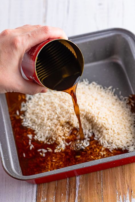 pouring beef broth into baking dish. Beef Consommé Rice, Brown Rice Recipes Beef Consume, Beef Broth Rice Recipes, Beef Broth Rice, Rice With Beef Broth, Stew Beef And Rice, Butter Rice Recipe, Dirty Rice Recipe Easy, Sides Dinner