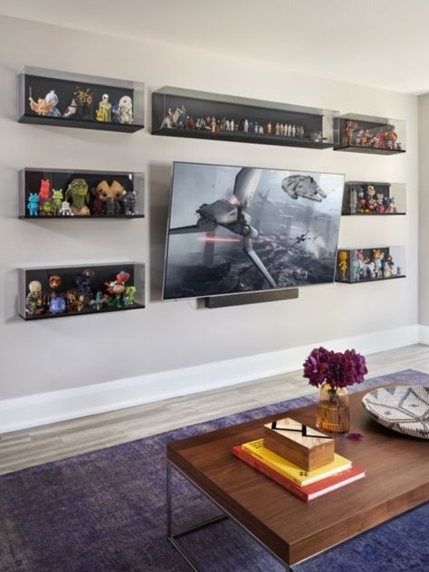 11 Easy Gallery Wall Ideas That Work In Every Space | Chatelaine Display Cases For Action Figures, Action Figures Shelves, Large Wall Display Shelves, Collectors Display Shelves, How To Display Action Figures, Home Office Display Wall, Game Room Display Shelves, Display Cases For Collectables, Man Cave Display Ideas