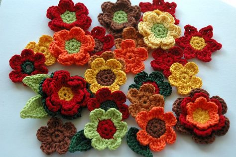 Crochet Flowers in Autumn Colours | Flickr - Photo Sharing! Autumn Crochet, Puff Flower, Crochet Puff Flower, Crochet Wreath, Crochet Leaf Patterns, Crochet Eyes, Crocheted Flowers, Bamboo Yarn, Crochet Leaves