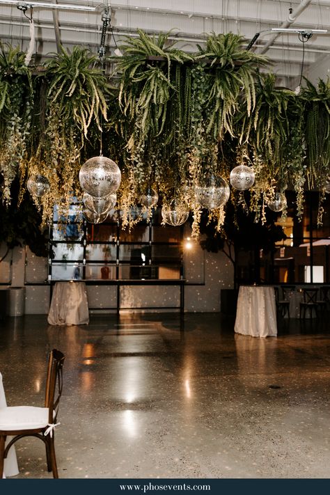 Disco And Greenery, Disco Balls With Greenery, Disco Balls At Wedding Reception, Greenery With Disco Balls, Boho Jungle Wedding, Dark Disco Wedding, Disco Ball Ceiling Wedding, Disco Ball Greenery, Tropical Disco Wedding Theme