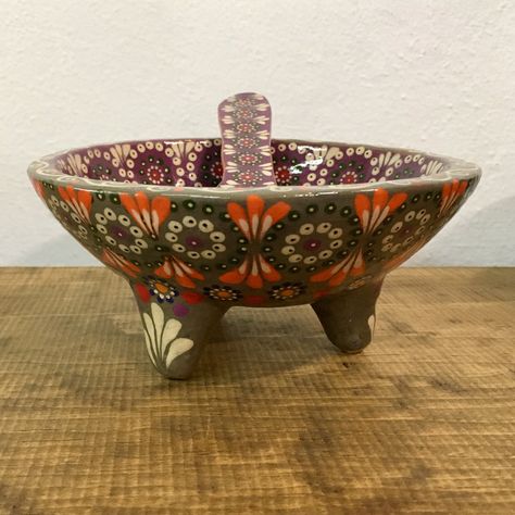 "Authentic Mexican salsa bowl and serving spoon from Michoacán, Mexico. Use this gorgeous piece of handmade Mexican pottery as a salsa dish or guacamole bowl. Painted in a distinct style known as \"capulineado\" after the artisans' home town of Capula, Michoacán. Each circle of dots represents \"la flor capulín\", or the flowers seen on the capulín trees common around the region. This earthenware serving bowl is handmade & hand-painted by our partner Mayra and her husband Juan. The couple produc Salsa Bowls Pottery, Mexican Pottery Decor, Authentic Mexican Salsa, Spanish Style Kitchen, Pottery Mexican, Round Flowers, Salsa Bowls, Mexican Salsa, Art Guide