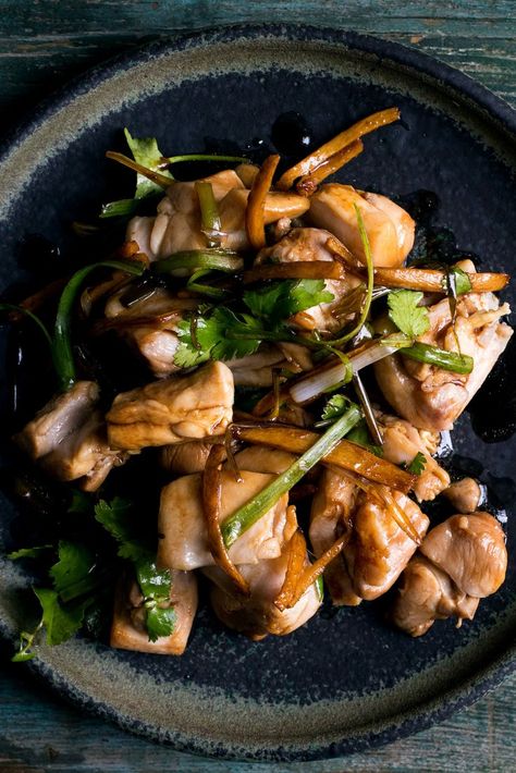 In this easy chicken stir-fry, adapted from Lan Hing Riggin, a home cook from Virginia who grew up cooking for her family in Hong Kong, slivers of ginger and scallions turn golden, adding their sweetness and pungency to the oil A dash of soy sauce provides saltiness and depth, while a full cup of cilantro leaves, used as garnish, makes the dish a bit lighter and fresher Fire seekers can add a sliced chile or two along with the ginger. Ginger Scallion Chicken, Scallion Oil Chicken, Scallion Chicken Recipe, Easy Sesame Chicken, Pressure Cooker Spaghetti, Easy Chicken Stir Fry, Chicken Korma, Pressure Cooker Chicken, Poached Chicken