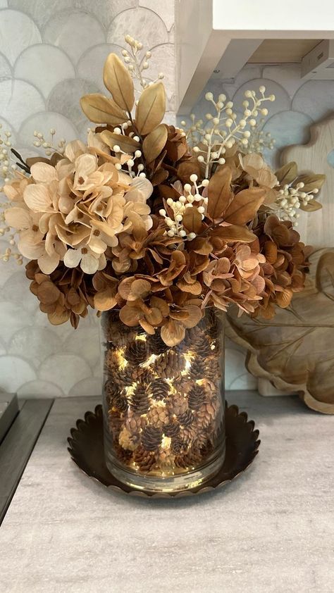 Ashley Savage | Home Decor on Reels | Earth, Wind & Fire · September Fall Glass Vase Filler Ideas, Large Glass Vase Filler Ideas, Glass Vase Filler Ideas, Jar Filler Ideas, Campfire Foods, Vase Filler Ideas, Hone Decor, Mini Pinecones, Pinecone Centerpiece