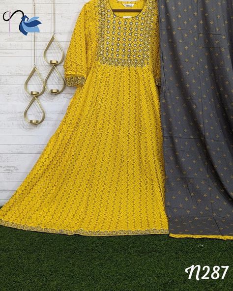 "Dazzling Daffodil: Yellow Umbrella Kurti and Dupatta Ensemble" Wrap yourself in the warmth of sunshine with our Radiant Bloom ensemble. This vibrant yellow umbrella kurti, paired with a matching dupatta, exudes a lively charm that brightens any occasion. Embrace the elegance of floral-inspired motifs and indulge in the joyous spirit of summer with this delightful ensemble. #SunshineChic #YellowUmbrella #SummerStyle #EthnicElegance #FloralFashion #DupattaLove #SunnyDays #Fashionista #Radian... Umbrella Kurti, Daffodil Yellow, Yellow Umbrella, Floral Fashion, Daffodils, Sunny Days, Umbrella, Summer Fashion, Saree