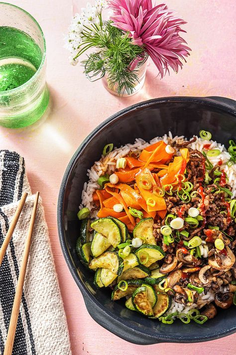 Korean Beef Bibimbap with Zucchini, Mushrooms, and Carrots | More easy beef and rice bowl recipes on www.hellofresh.com Hello Fresh Korean Beef Bibimbap, Korean Beef Bibimbap, Beef Bibimbap, Zucchini Mushrooms, Bibimbap Recipe, Burger Bites, Cibo Asiatico, Hello Fresh Recipes, Rice Bowls Recipes