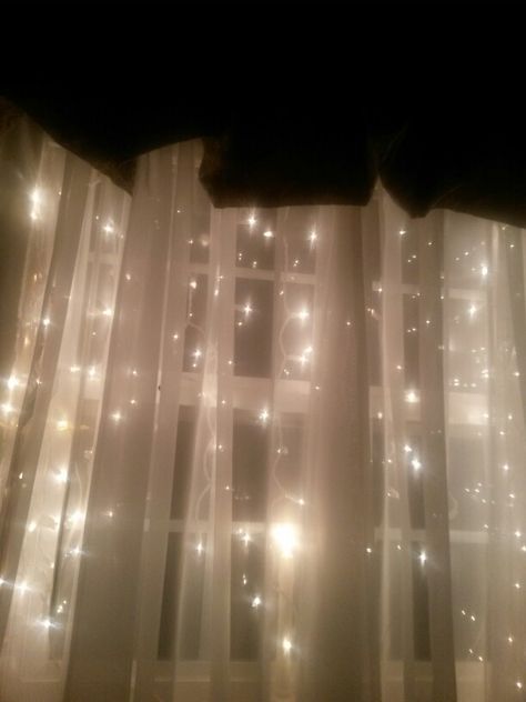 Christmas ice cycle lights behind sheers look magical in any room! Aesthetic Winter Room, Winter Bedroom Decor Cozy, Winter Room Decor Diy, Bejeweled Aesthetic, Room Decor Diy Ideas, Fairy Lights Aesthetic, Winter Room Decor, Sheer White Curtains, Winter Fairies