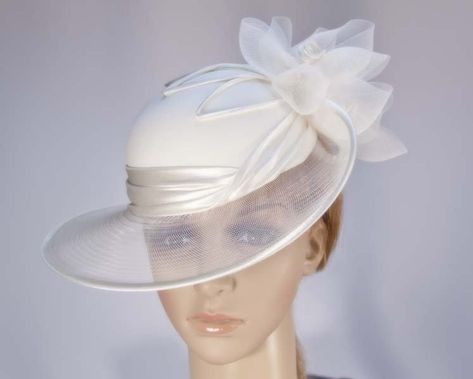 This stunning cream hat from our beautiful range of mother of the bride, evening, church and special occasion hats is hand made from combination of dull and shiny sides of luxurious fabric, fully lined and has comb for comfortable wearing. This designer fashion hat is made to order and we can make it in many colours. Just let us know the colour you like. We can also make the hat from your fabric. Please allow up to a week for the creation of the hat.  Made in Australia  Custom made to match your Wedding Hats And Fascinators, Special Occasion Hats, Mother Of The Bride Hats, Fascinator Hats Wedding, Cream Hat, Hats And Fascinators, Occasion Hats, Fashion Designers Famous, Sinamay Hats