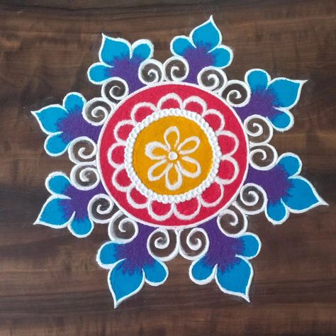 rose rangoli design • Instagram Simple Colorful Rangoli, Rangoli Designs Latest Small, Latest Rangoli Designs Creative 2024, Rangoli Designs Diwali Latest Images, Rangoli Simple Design Easy, New Small Rangoli Designs, Diwali Kolam Design, Small Rangoli Design Simple, Rose Rangoli Designs