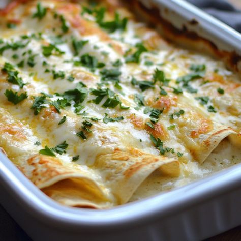 🌯🌟 Savor the creamy and tangy flavors of Chicken Enchiladas with Sour Cream White Sauce! 🌮✨ #ChickenEnchiladas #MexicanFood Chicken Enchiladas with Sour Cream White Sauce Ingredients: Cooked chicken breast (2 cups, shredded) Flour tortillas (8) Monterey Jack cheese (2 cups, shredded) Butter (3 tbsp) Flour (3 tbsp) Chicken broth (2 cups) Sour cream (1 cup) Green chilies (1 can, 4 oz, diced) Instructions: Preheat oven to 350°F (175°C). Fill tortillas with chicken and 1 cup of cheese. Roll u... Cheese Sauce For Enchiladas, Chicken Enchiladas With Sour Cream, Cheese Roll, Instagram Recipes, Cashew Cream, Cooked Chicken, Monterey Jack, Trending Recipes, White Sauce