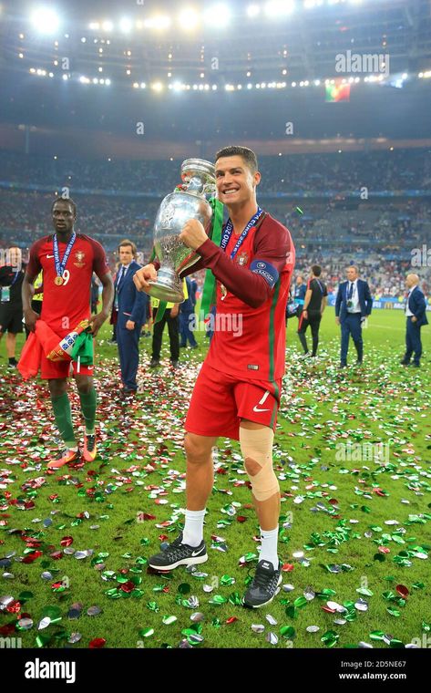 Download this stock image: Portugal's Cristiano Ronaldo celebrates with the trophy on the pitch after Portugal win the UEFA Euro 2016 final. - 2D5NE4H from Alamy's library of millions of high resolution stock photos, illustrations and vectors. Portugal Euro 2016, Portugal Euro, Cristiano Ronaldo Portugal, Uefa Euro 2016, Cristiano Ronaldo Wallpapers, Ronaldo Wallpapers, Euro 2016, The Pitch, Image Processing