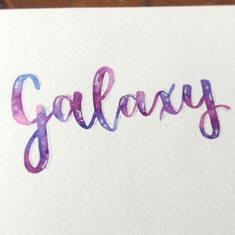 Galaxy Lettering is really popular and you can see how I created this by visiting my YouTube Channel. #youtube #galaxy #watercolourlettering #galaxylettering Galaxy Lettering, Heading Design, Hostel Room, Galaxy Fashion, Galaxy Theme, Watercolor Galaxy, Watercolor Lettering, Word Design, Bullet Journaling