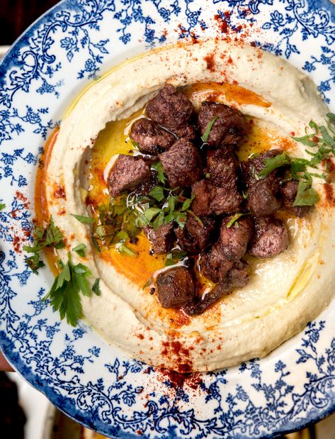 Hummus with Sumac-Spiced Spring Lamb - WILD GREENS & SARDINES Sumac Lamb, Arabisk Mad, Marinated Lamb, Middle East Recipes, Spiced Chickpeas, Doner Kebab, Tomato Cucumber, Carb Free, Eastern Cuisine