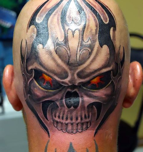 Angry skull with fire in it's eyes on the man's head. Style: Tribal. Color: Black. Tags: Crazy, Badass, Awesome Underarm Tattoo, Scalp Tattoo, Girl Neck Tattoos, Skull Hand Tattoo, Rib Tattoos For Women, Girl Back Tattoos, Wild Tattoo, Head Tattoo, Biomechanical Tattoo