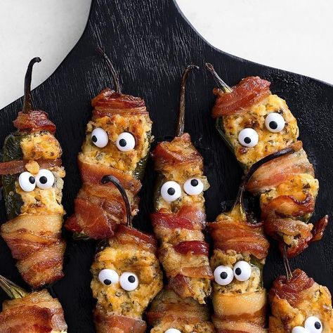 Williams Sonoma on Instagram: "How fun are these Halloween Jalapeno Poppers 👀? Cream cheese–filled jalapeños shrouded in bacon and googly eyes that stare back at you. See the entire WS Test Kitchen Halloween party menu with the link in bio." Halloween Jalapeno Poppers, Gothic Treats, Halloween Party Menu, Kitchen Halloween, Halloween Sleepover, Bacon Wrapped Jalapeno Poppers, Bacon Wrapped Jalapenos, Easy Halloween Food, Alcohol Aesthetic