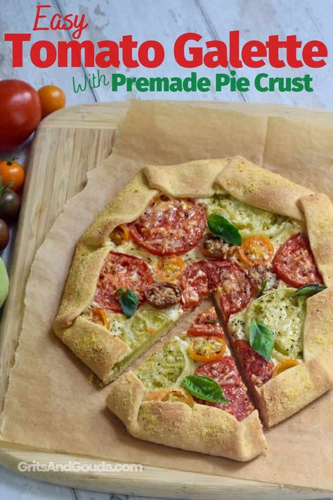 This easy tomato galette recipe (free-form rustic tart) is made with premade pie crust dough, spreadable garlic and herbs cheese, and sliced fresh tomatoes. Serve this simple tomato and cheese tart for brunch, a light dinner or a Southern appetizer. Tomato And Cheese Galette, Spreadable Garlic, Rustic Tart, Southern Appetizers, Tomato Galette, Tomato Tart Recipe, Premade Pie Crust, Brunch Bake, Cooking With Fresh Herbs