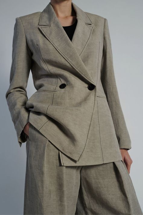 The Kara Jacket in Grey Linen offers effortless and easy style with its soft tailored design, accented by a double button front and black top stitch. Cut in a long line, this blazer is perfect for any occasion. Made with high-quality linen for a comfortable and polished look. Soft Tailoring, Tuxedo Pants, Easy Style, Outerwear Vest, Linen Jacket, Tailored Design, New Pant, Blazer Vest, Gray Linen